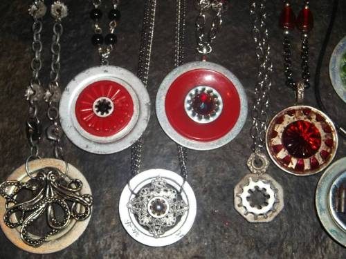 Jewelry of vintage components and vintage fabric/